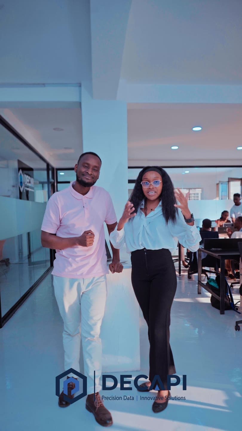 The DECAPI marketing team on the office floor